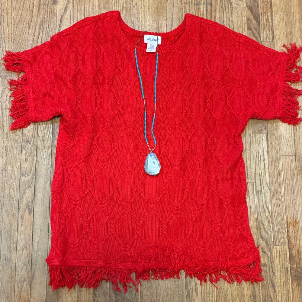 Vintage Boho Red Fringe Knit Top M/L EUC

57% Cotton
33% Poly